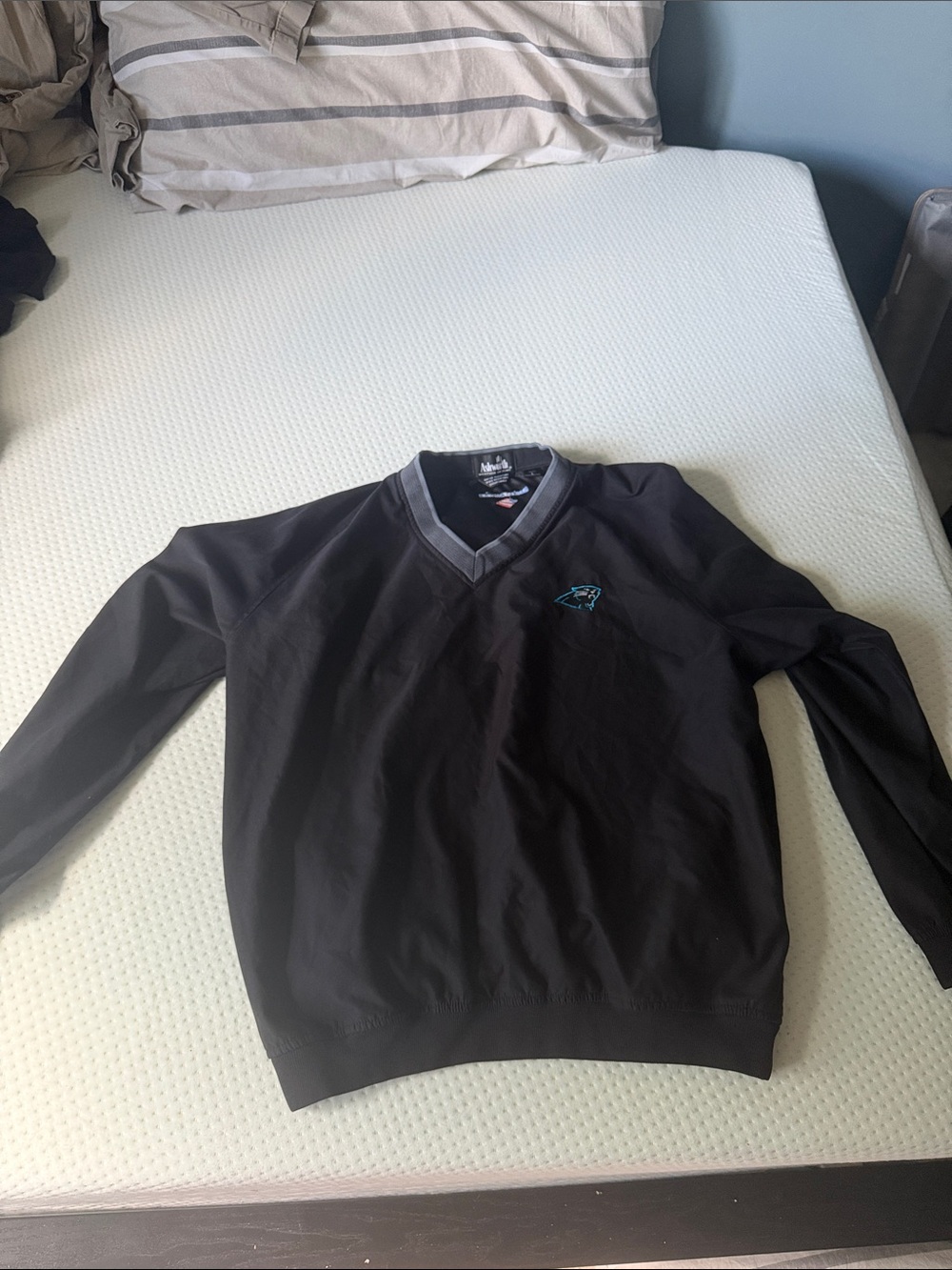 Ashworth Black V-Neck Sweater with Teal Logo